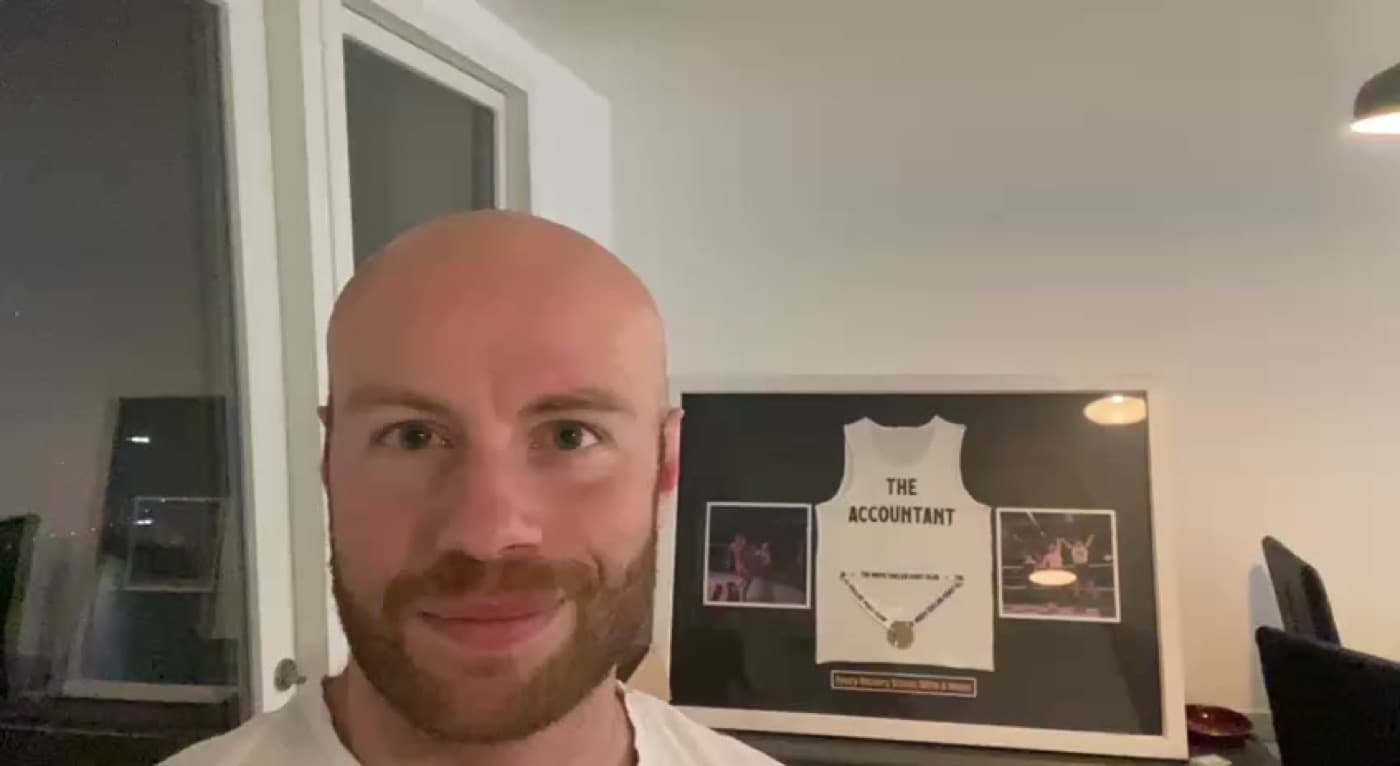 An Insta GQ client recording a video review at home