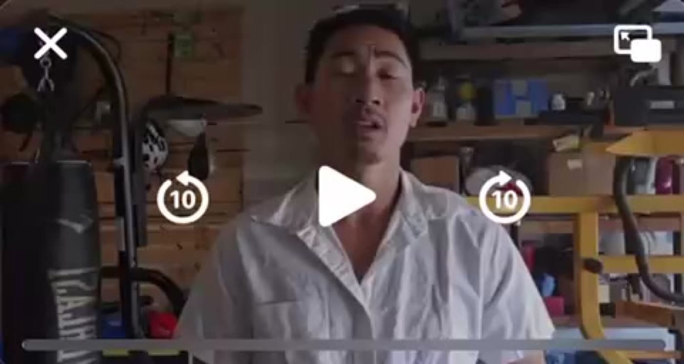 An Insta GQ client recording a video review in his garage gym